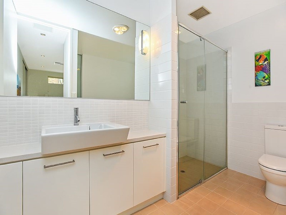 Equipped with walk-in showers and ample vanity space, providing added comfort for families or groups.