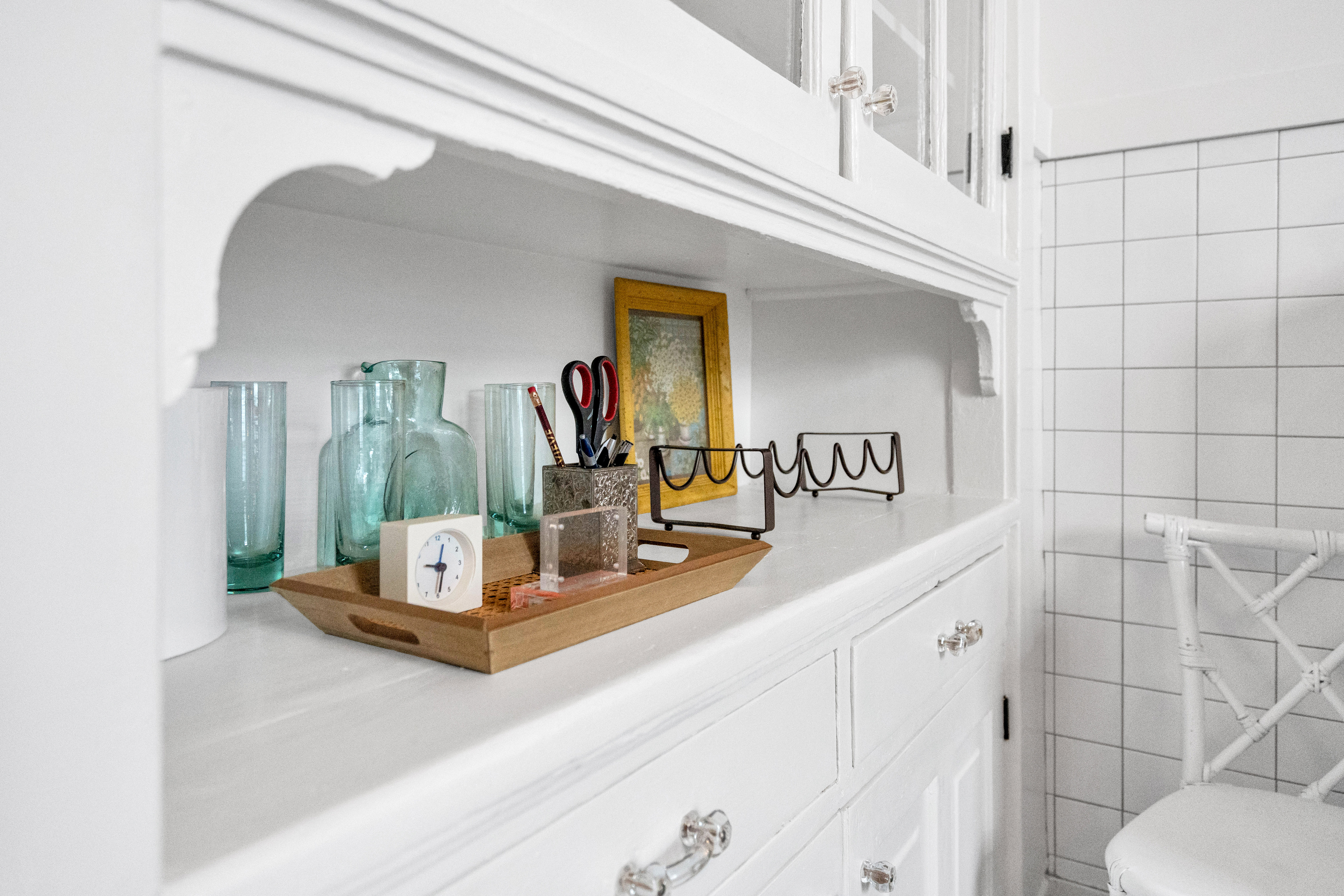 Styled shelf with glassware and décor