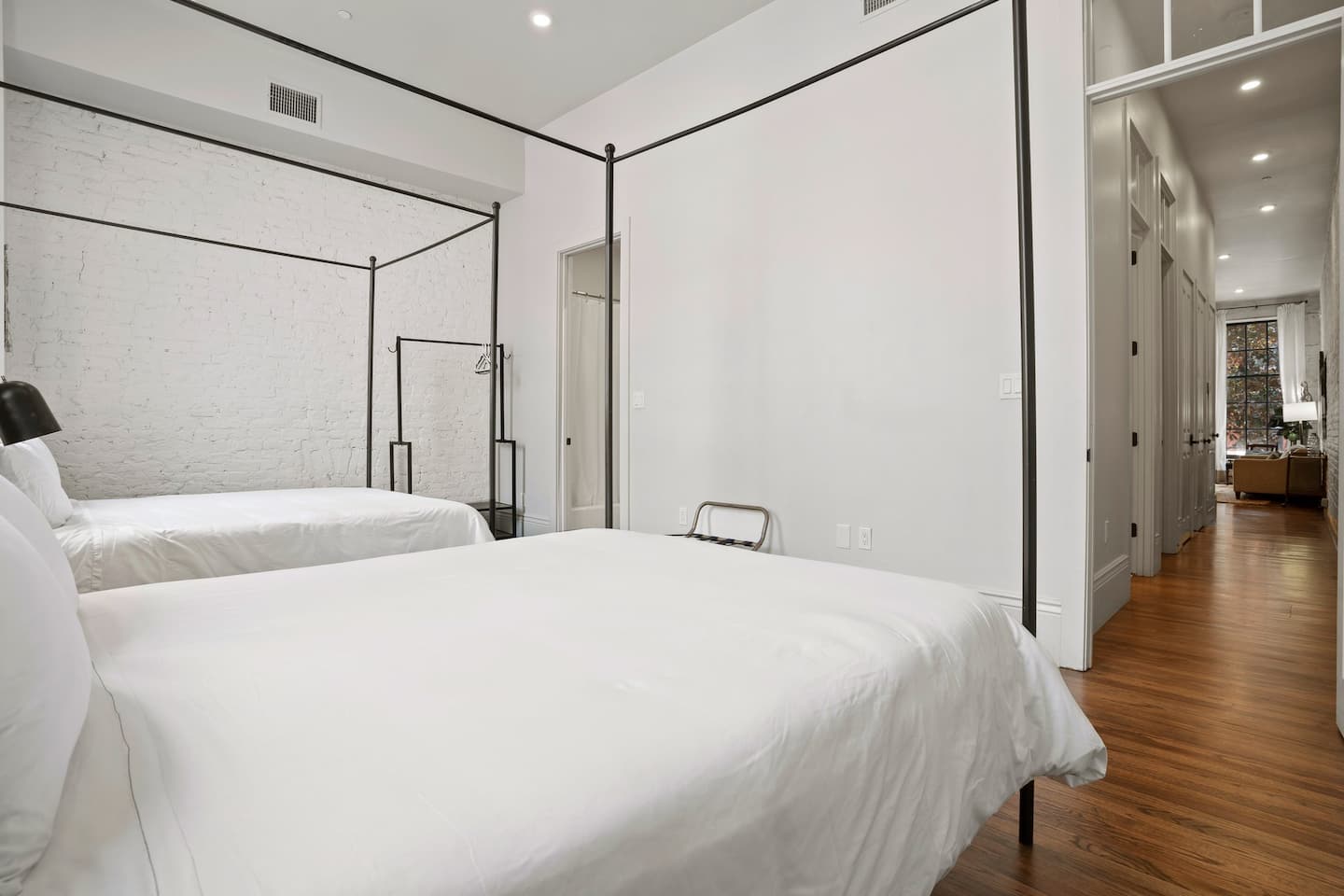 Large Master bedroom with en suite bathroom | Two queen beds