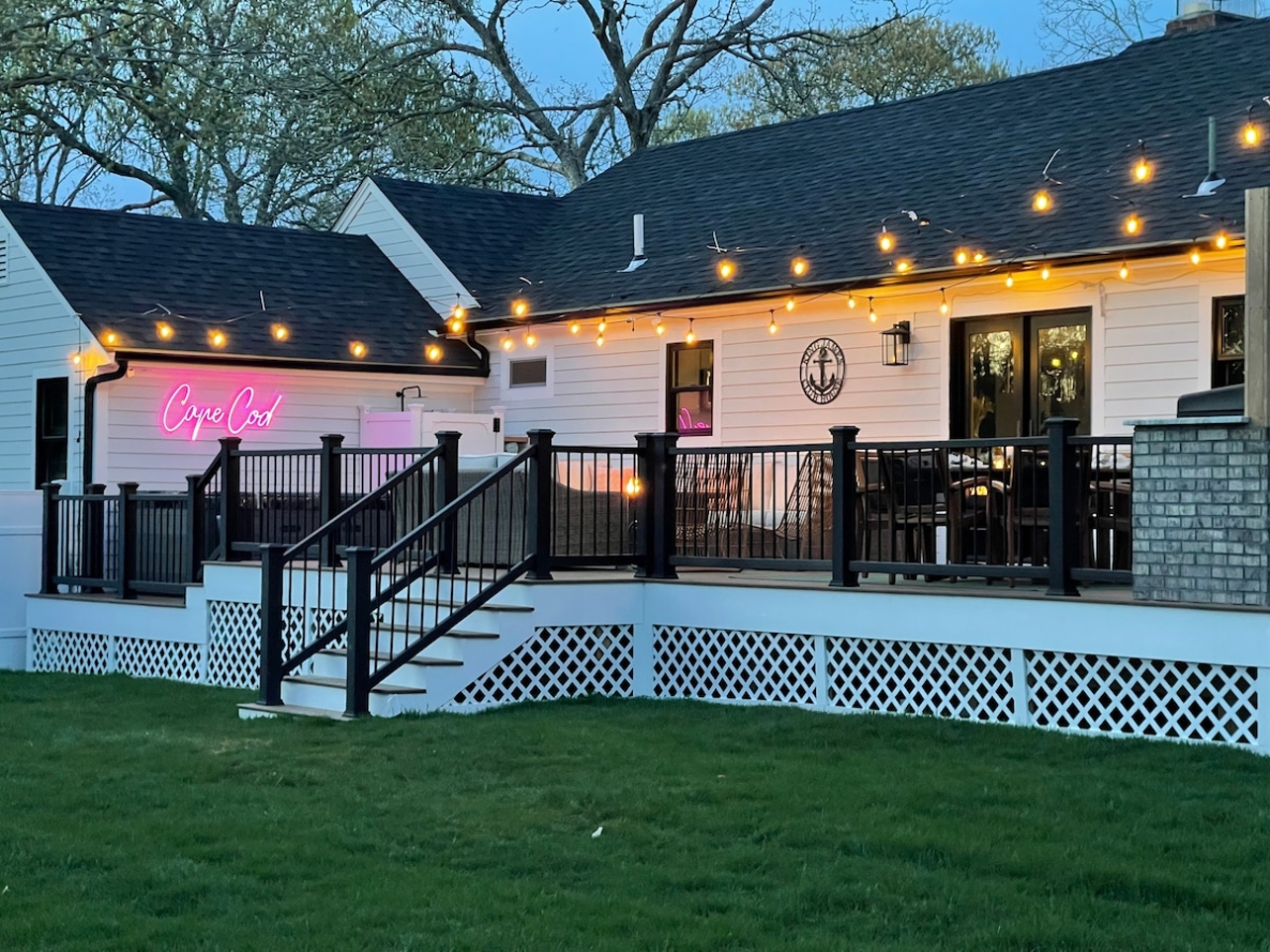 King James Club House outdoor deck at dusk