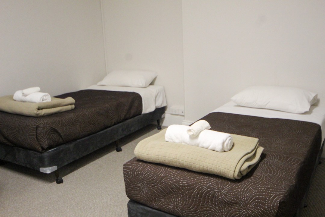 Sleeps 6-8 guests comfortably across two bedrooms plus a fold-out couch, ideal for couples or family getaways.