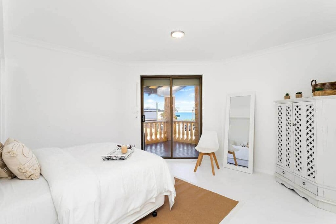 Wake up to ocean views: big Queen bed, spacious room.