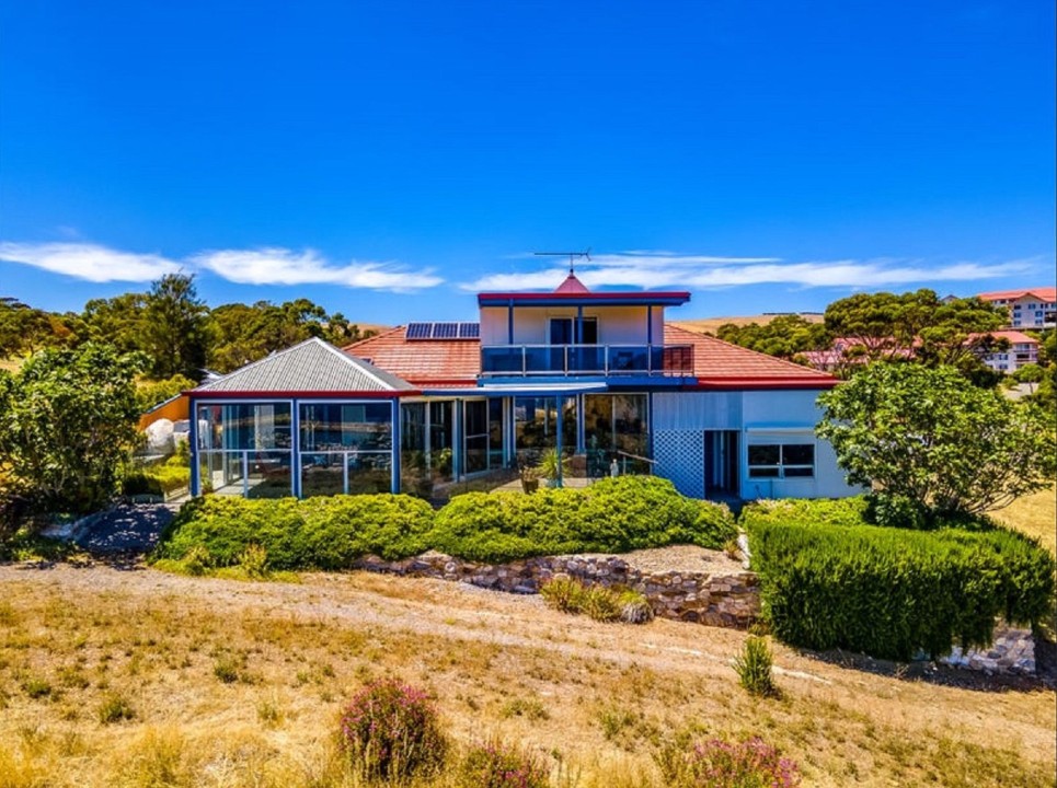 Perched above Wirrina Cove, offering uninterrupted vistas of the ocean, marina, rolling hills, and Wirrina Reservoir.