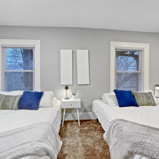 Bedroom 2 - two plush queen beds - main level