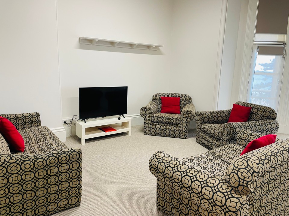 Features open-plan living and dining, a well-equipped kitchen, smart TV, split-system air conditioning, and a sleek, modern bathroom—designed for comfort and convenience.