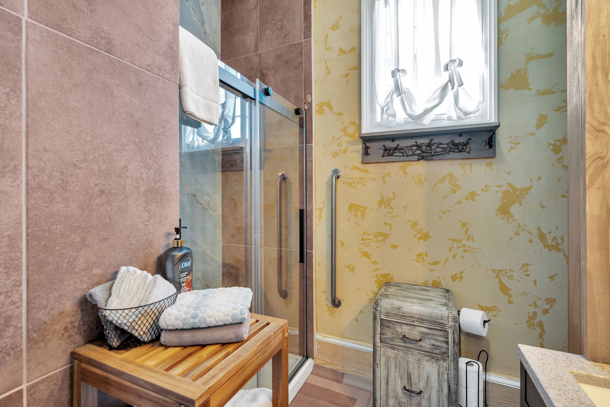 Bright walk-in shower with vintage charm