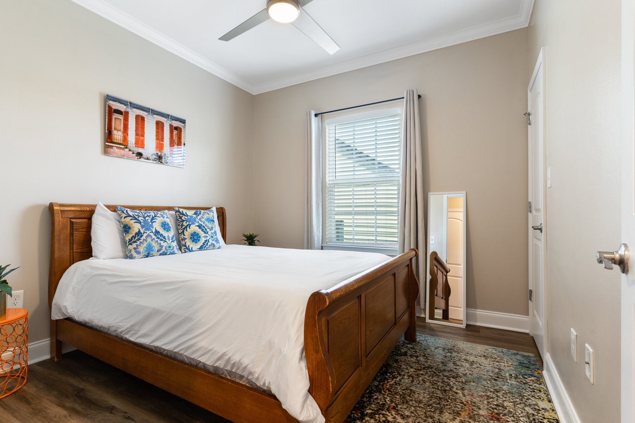 First bedroom down the hall. Full mirror and closet space provided!