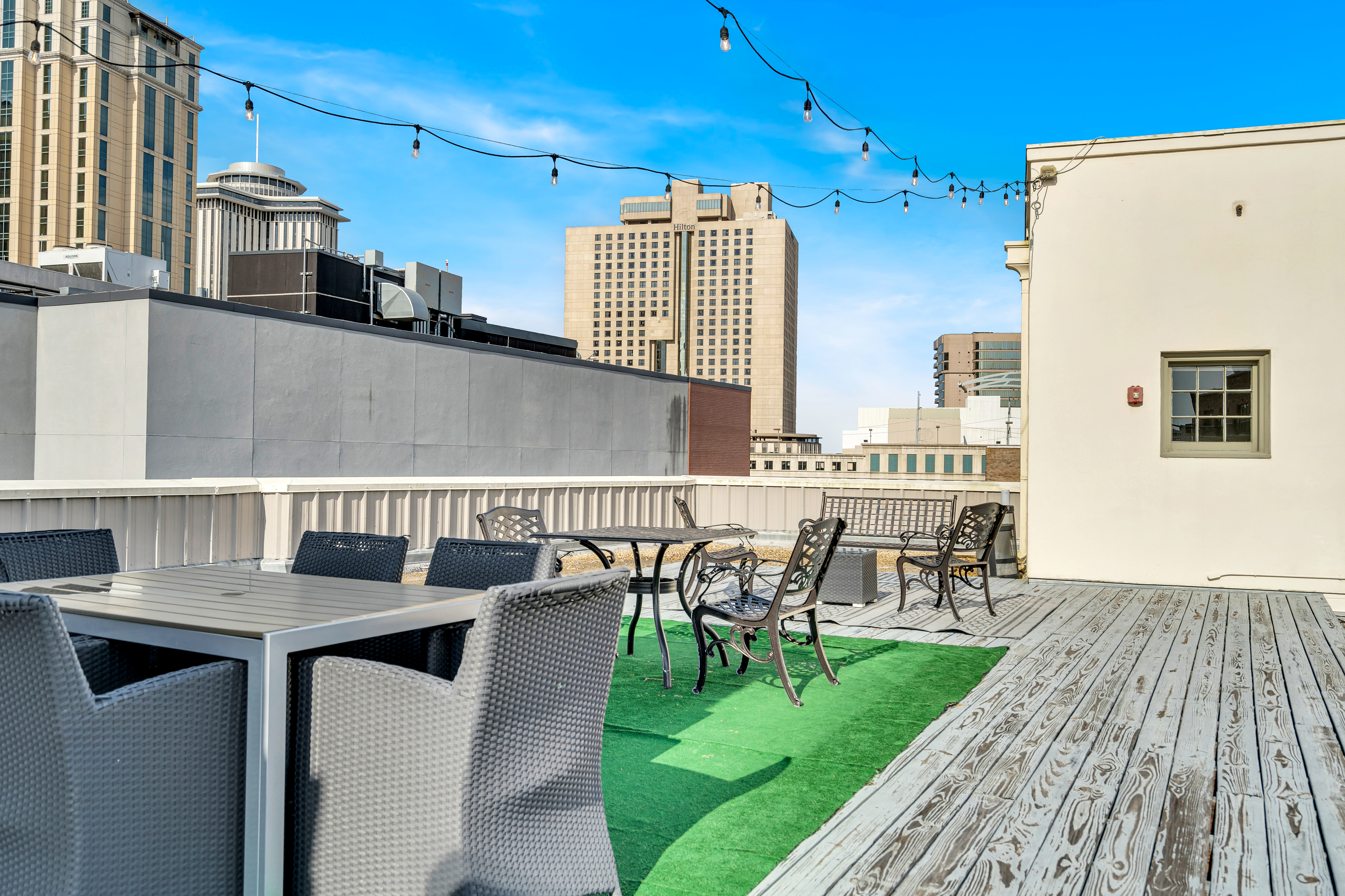Rooftop dining with skyline views.