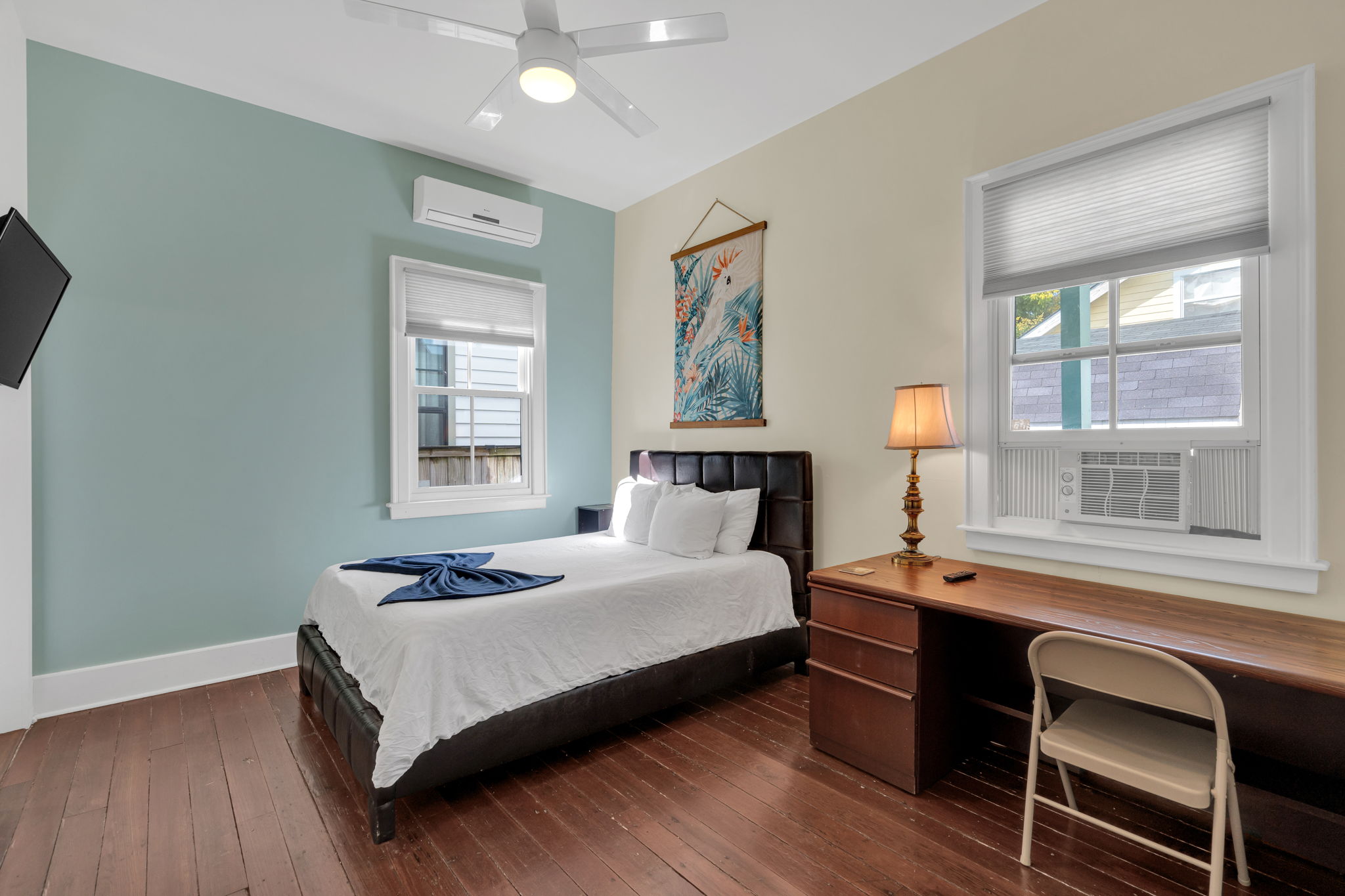 Bedroom-3: Peaceful bedroom with bright natural light and cozy bedding