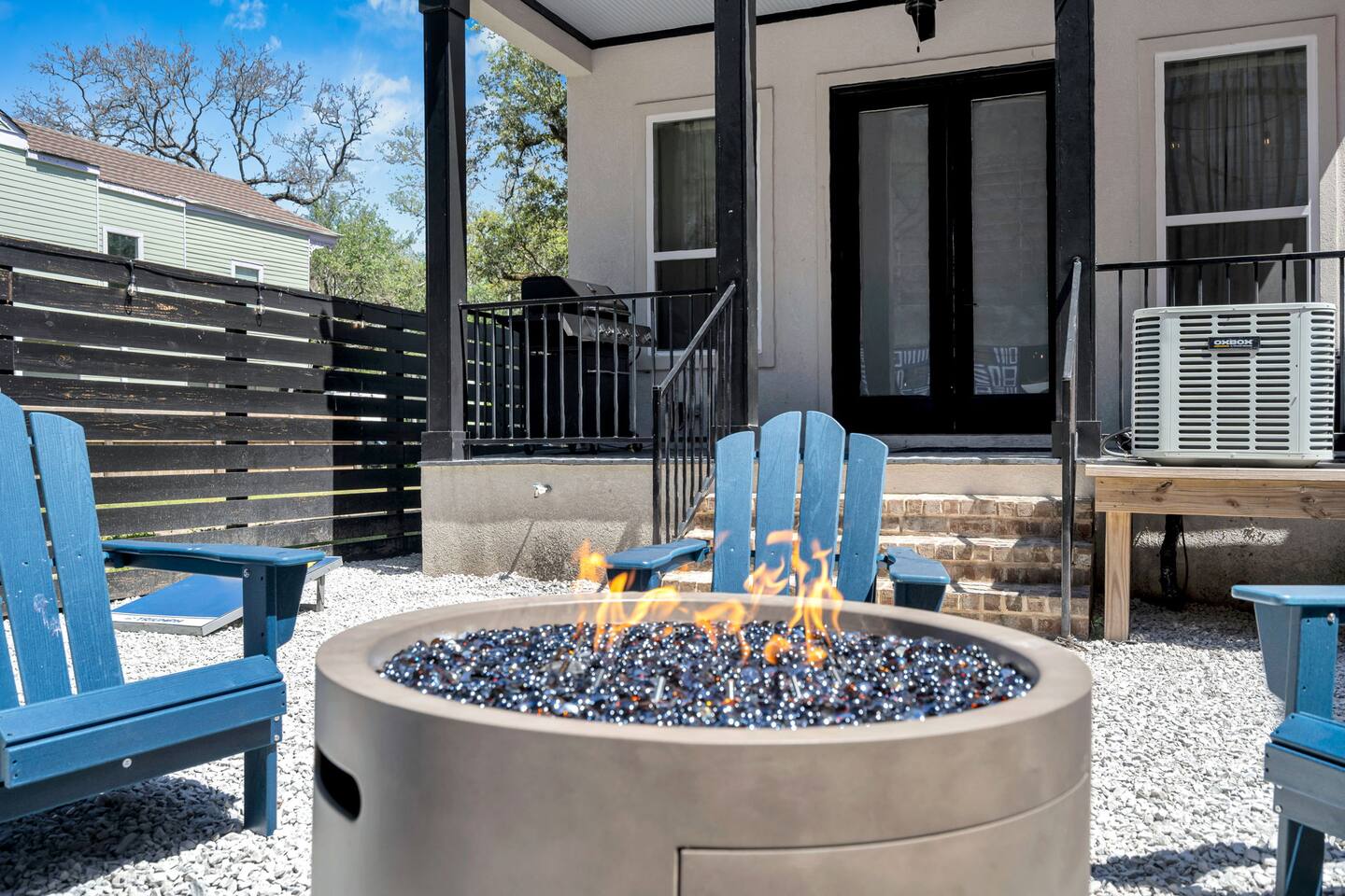 Fire pit nights just steps from your back door—relax and unwind, NOLA style.
