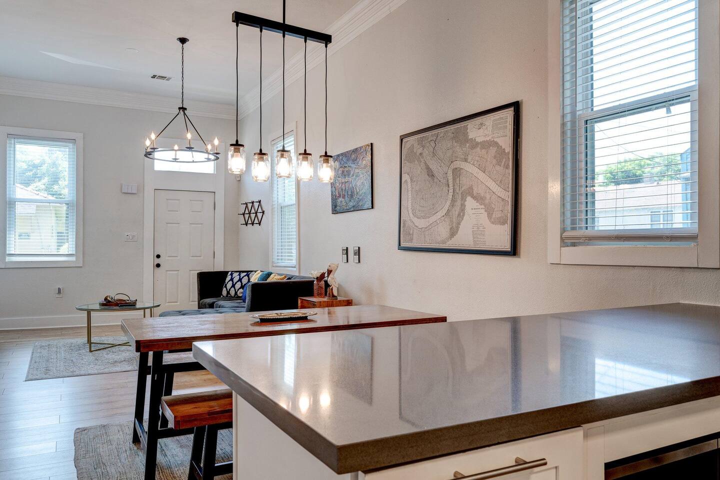 View of the dining room space and the living room