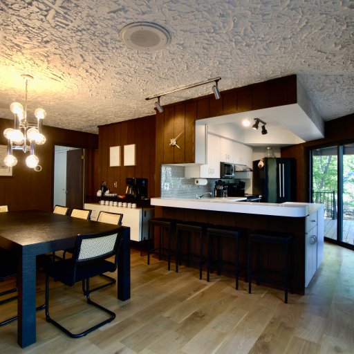 Kitchen and dining area with modern island seating