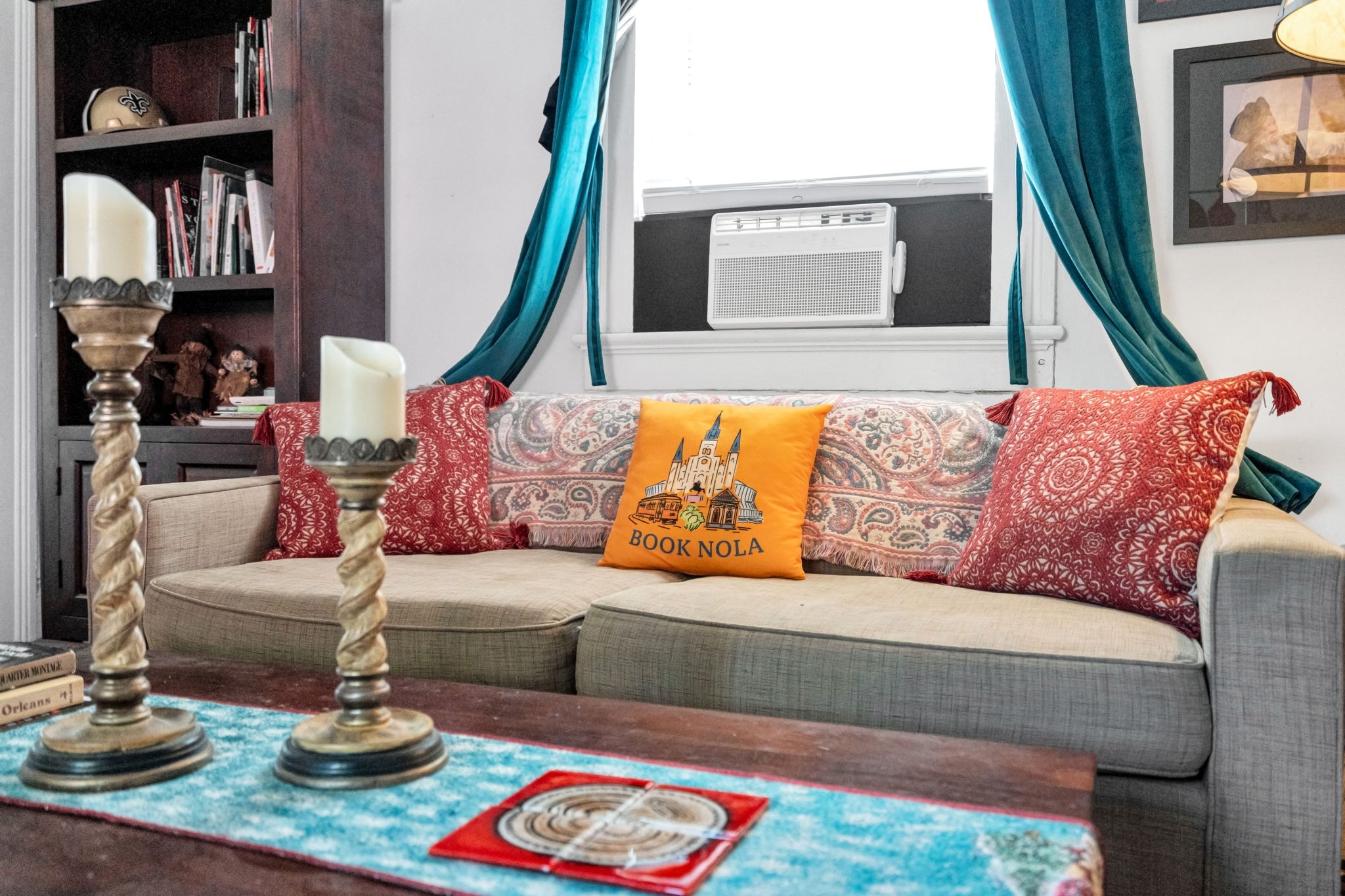 Relaxed living space with signature Book NOLA touches