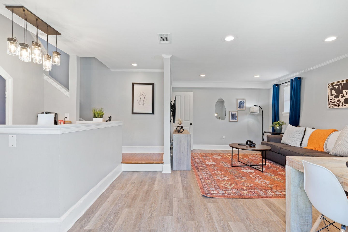 Living Room | Kitchen Area | Staircase leading to Master Bedroom