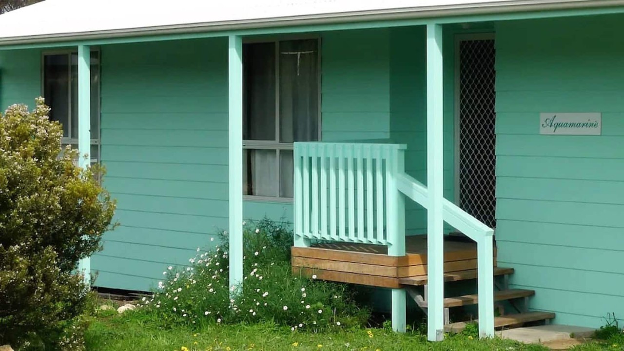 Access to the beach is immediately behind the house via well-maintained steps over the dune with no street crossing.