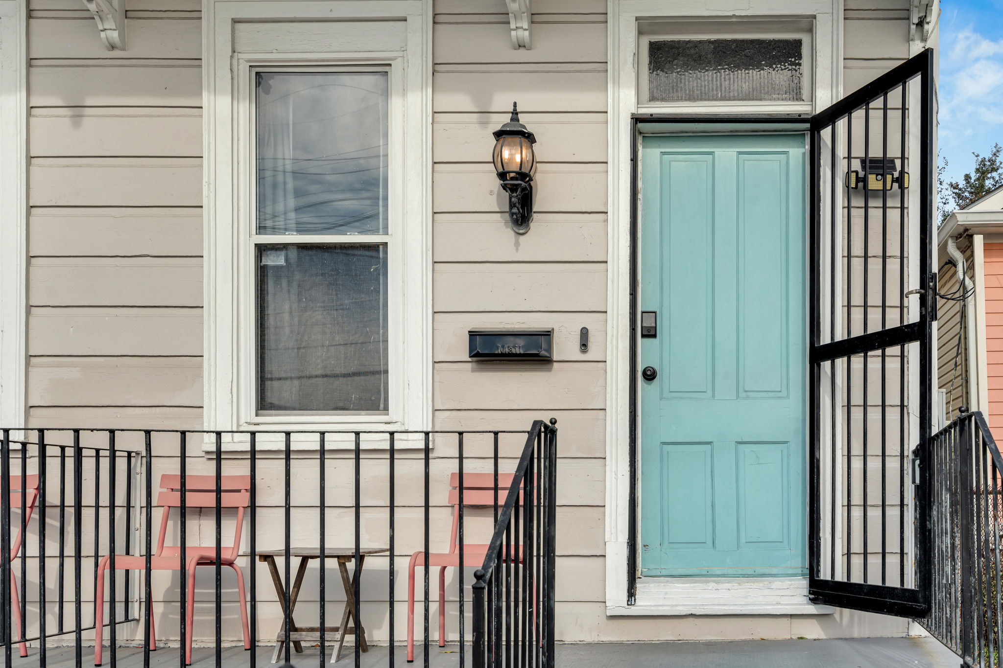 Iconic teal front door with local charm