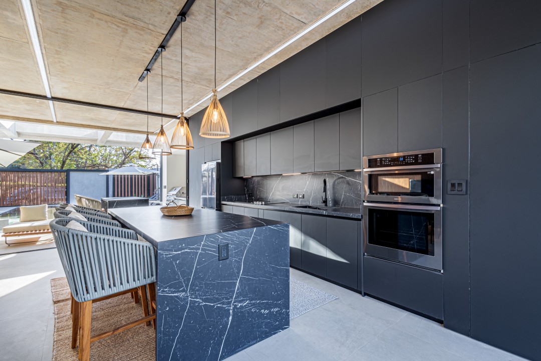 Modern fully equipped kitchen with plenty of counter space, perfect for ...