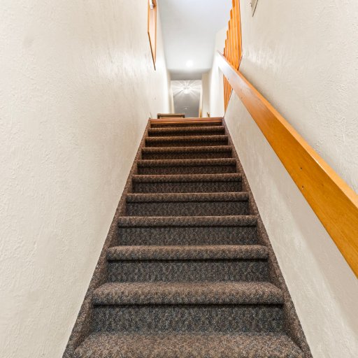 Second staircase up to the other two bedrooms.