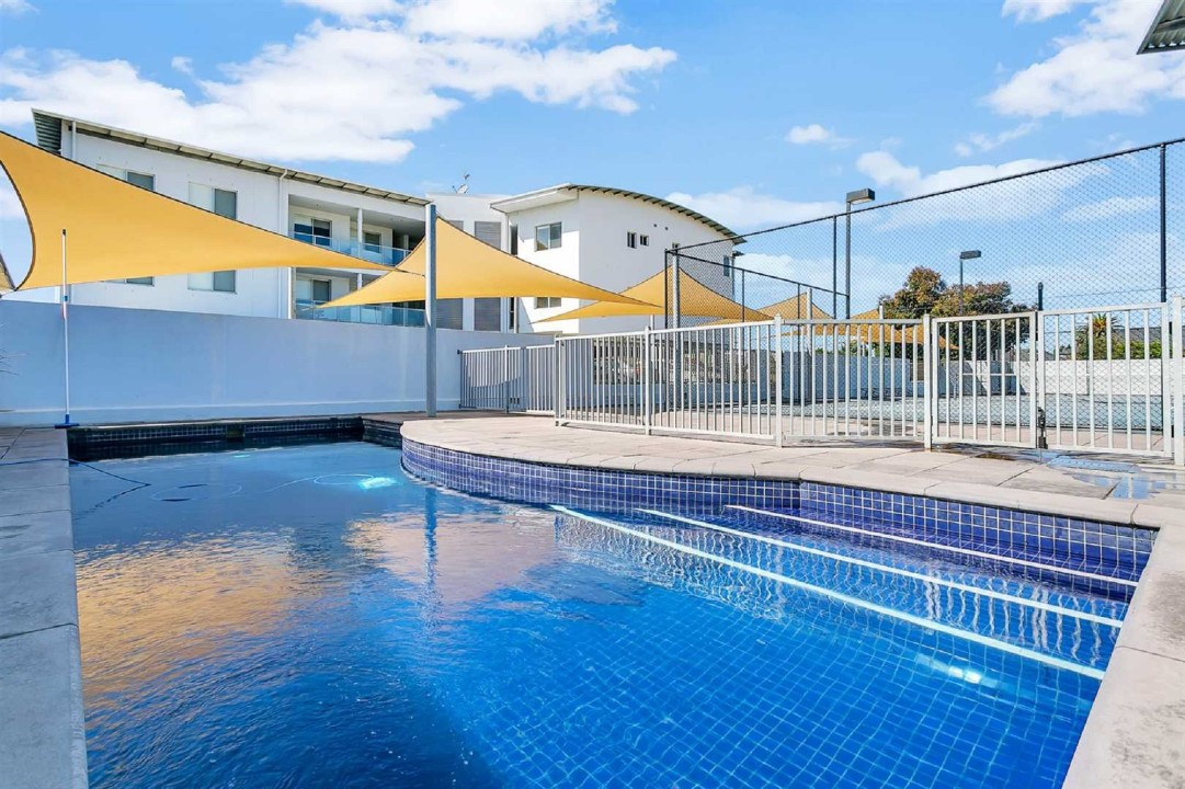 Guests can enjoy a heated swimming pool, full-size tennis court, and ping pong table—all within the secure apartment complex.