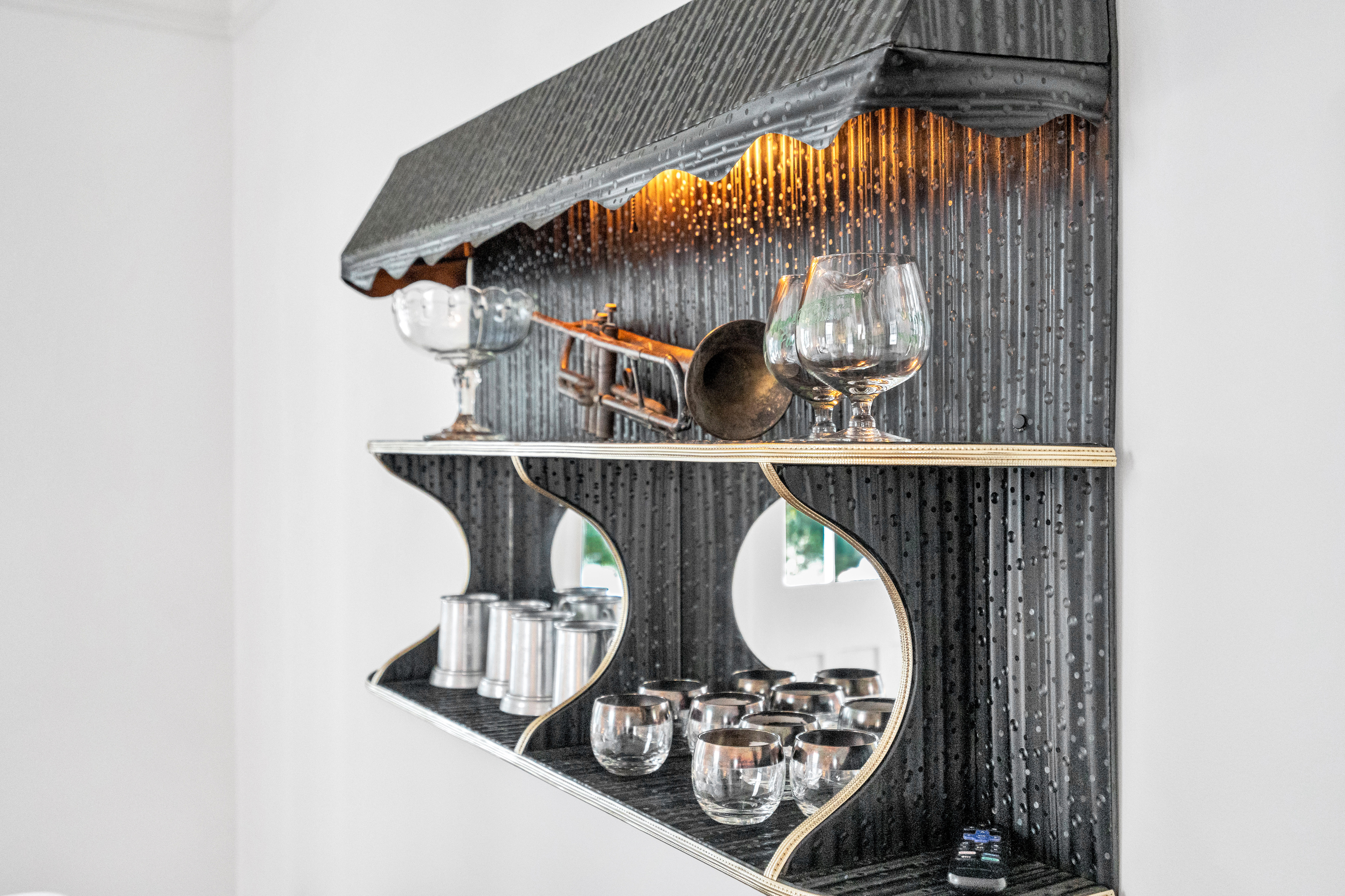 Bar display with wine and cocktail glasses